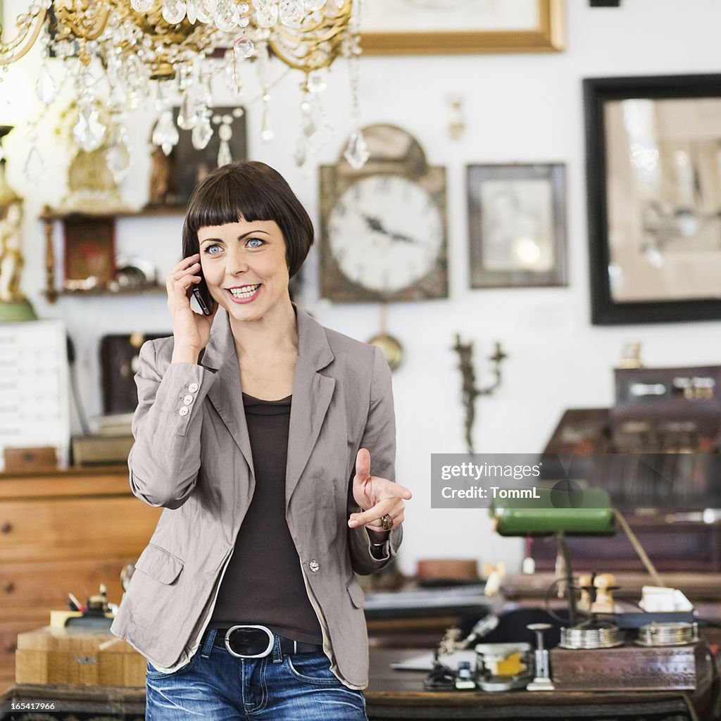 Business Owner Using Smart Phone