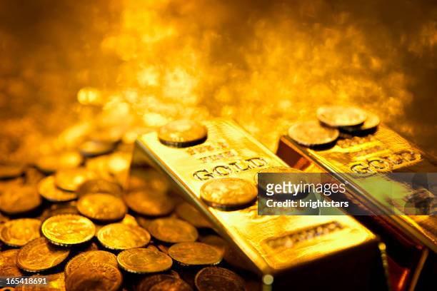 gold bars and coins - gold coloured stock pictures, royalty-free photos & images