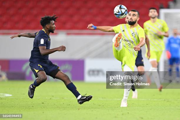 Naïm Sliti of Al Ahli clears the ball during the Qatar Stars League match between Al Ahli and Al Gharafa at Al Thumama Stadium on September 01, 2023...