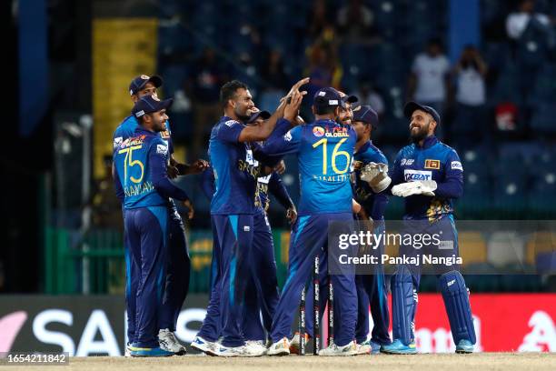 Dasun Shanaka of Sri Lanka celebrates the wicket of Mohammad Naim of Bangladesh during the Asia Cup match between Sri Lanka and Bangladesh at R....