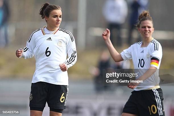 Lina Magull celebrates her team's first goal with Melanie Leupolz of Germany during the Women's UEFA U19 Euro Qualification match between U19 Germany...