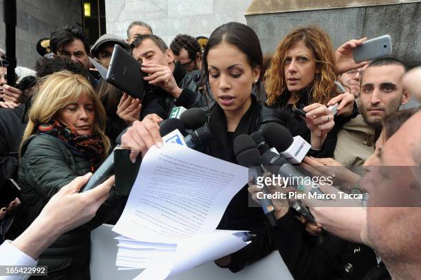 Karima El Mahroug reads a statement to members of the media as she protests in front of Palazzo di Giustizia on April 4, 2013 in Milan, Italy. Karima...
