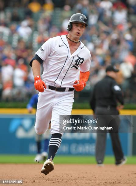 Kerry Carpenter of the Detroit Tigers runs the bases after hitting a grand slam home run in the 6th inning of the game against the Chicago Cubs at...