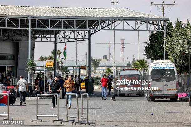 Palestinians wait to cross the Rafah border crossing with Egypt in the southern Gaza Strip on August 27, 2023. When the Palestinian government...