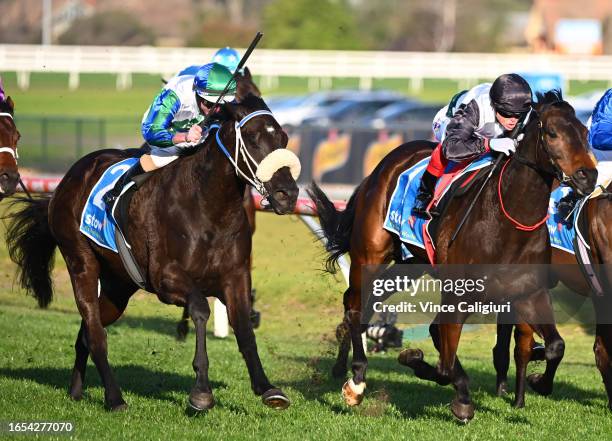 Craig Williams riding Mr Brightside defeats Luke Nolen riding I Wish I Win in Race 9, the Stow Storage Memsie Stakes, during Melbourne Racing at...