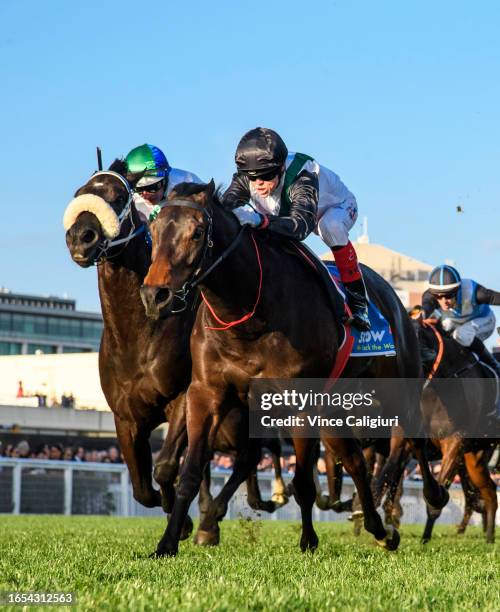 Craig Williams riding Mr Brightside defeats Luke Nolen riding I Wish I Win in Race 9, the Stow Storage Memsie Stakes, during Melbourne Racing at...