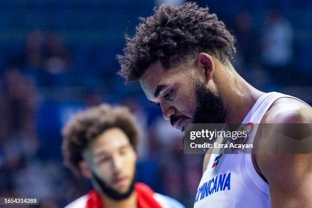 Karl-Anthony Towns of Dominican Republic walks out off court after losing the FIBA Basketball World Cup 2nd Round Group I game between the Dominican...