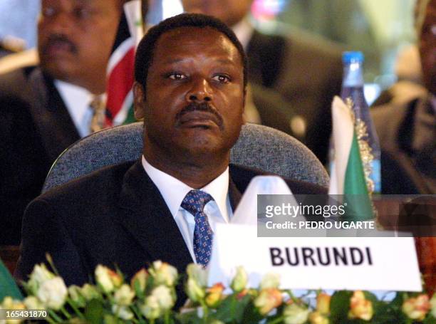Burundi's president, Pierre Buyoya listens to the conclusions after the meeting about peace negotiations for his country in Arusha, Tanzania, 26...