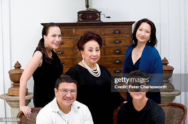 Kamala Sukosol, President of the Sukosol Hotels & Sukosol Group, posing for a portrait at the new Siam Hotel with her sons, Sukie Clapp and Krissada...