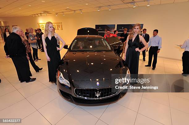 Guests attend the unveiling of the new Maserati Quattroporte at Ferrari Maserati Silicon Valley on April 3, 2013 in Redwood City, California.