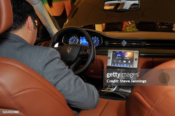 Guests attend the unveiling of the new Maserati Quattroporte at Ferrari Maserati Silicon Valley on April 3, 2013 in Redwood City, California.