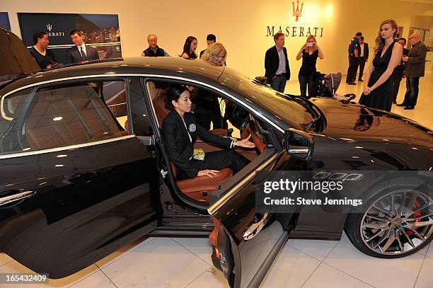 Guests attend the unveiling of the new Maserati Quattroporte at Ferrari Maserati Silicon Valley on April 3, 2013 in Redwood City, California.