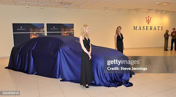 Guests attend the unveiling of the new Maserati Quattroporte at Ferrari Maserati Silicon Valley on April 3, 2013 in Redwood City, California.