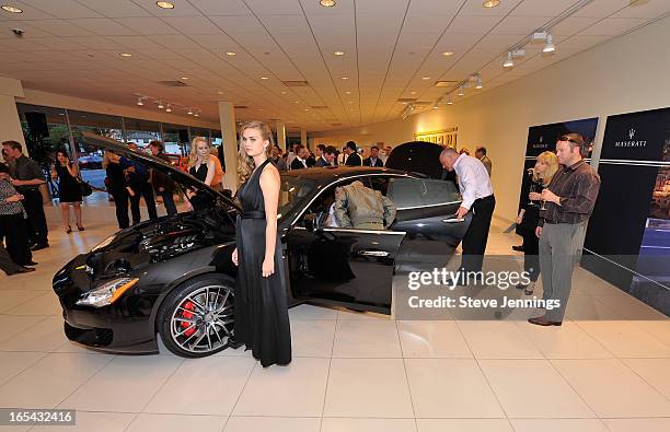 Guests attend the unveiling of the new Maserati Quattroporte at Ferrari Maserati Silicon Valley on April 3, 2013 in Redwood City, California.