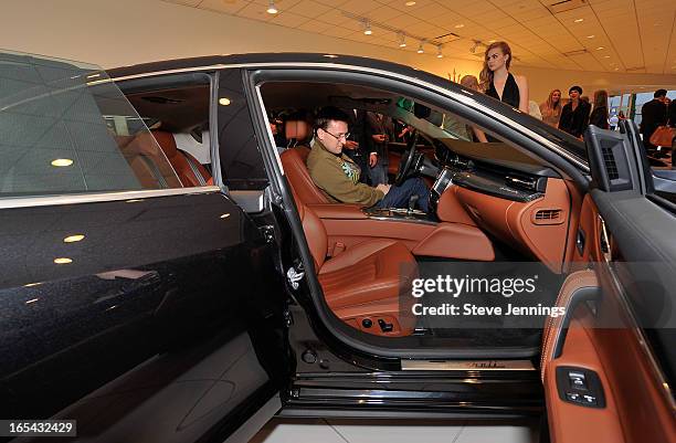 Guests attend the unveiling of the new Maserati Quattroporte at Ferrari Maserati Silicon Valley on April 3, 2013 in Redwood City, California.