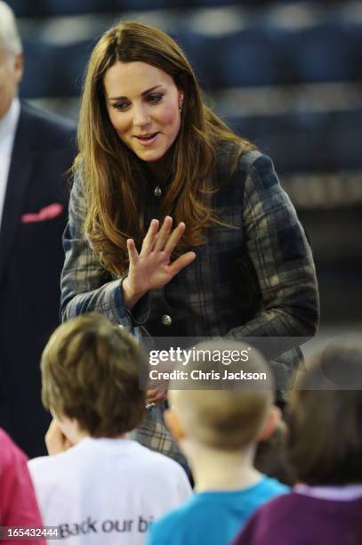 Catherine, Countess of Strathearn talks to children after a sports demonstration as they visit the Emirates Arena on April 4, 2013 in Glasgow,...