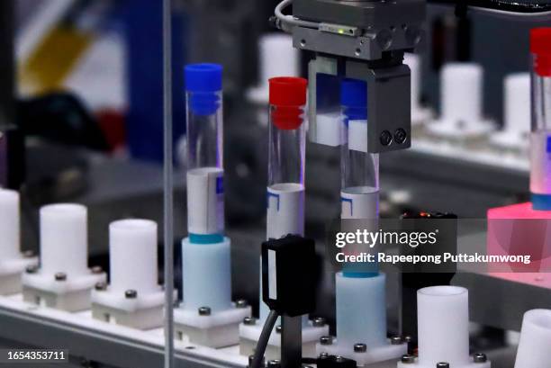close-up of pcr test automation laboratory - pcr device stock pictures, royalty-free photos & images