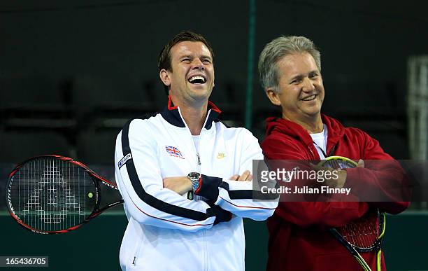 Captain Leon Smith, Captain of Great Britain enjoys a joke with LTA coach Louis Cayer during previews for the Davis Cup match between Great Britain...