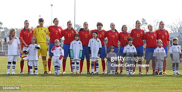 Spain's women's U19 team stands for the national anthem prior to the Women's UEFA U19 Euro Qualification match between U19 Germany and U19 Spain at...