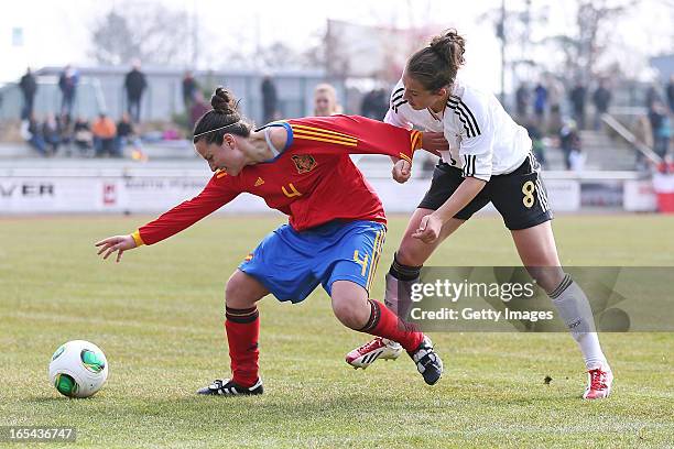 Sara Daebritz of Germany is challenged by Ivana Andres Sanz of Spain during the Women's UEFA U19 Euro Qualification match between U19 Germany and U19...