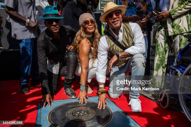 Jeffrey Daniel , Carolyn Griffey and Howard Hewett of Shalamar pose during the unveiling of their stone at the Music Walk of Fame in Camden on 9...