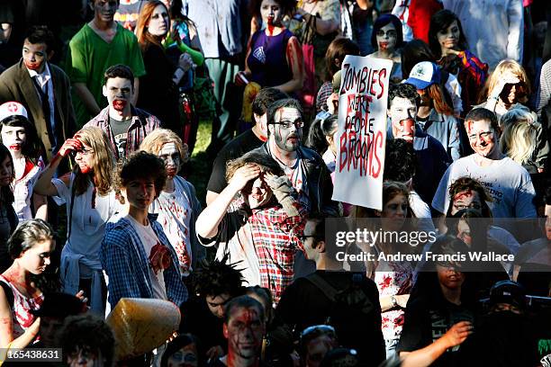 Large crowd gathers prior to the start of a zombie walk at Trinity Bellwoods Park in Toronto, October 21, 2007. The walk coincides with the After...
