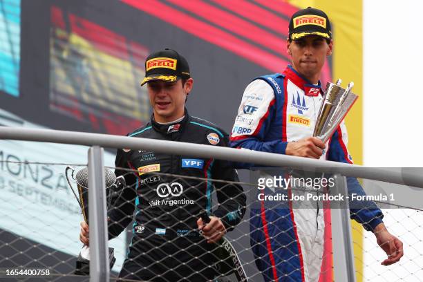 Race winner Franco Colapinto of Argentina and MP Motorsport and Second placed Gabriel Bortoleto of Brazil and Trident celebrate on the podium during...
