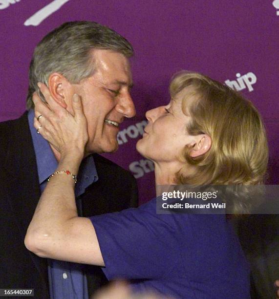 HarrisKiss_BW01- File photo of Ontario Premier Mike Harris getting a kiss from his wife Janet during his victory speech June 3, 1999. DIGITAL IMAGE