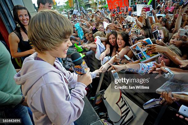 Toronto - August 7th, 2009: Justin Bieber greets screaming fans at the Much Music Environment, August 7th, 2009. Bieber, a 15-year-old from...