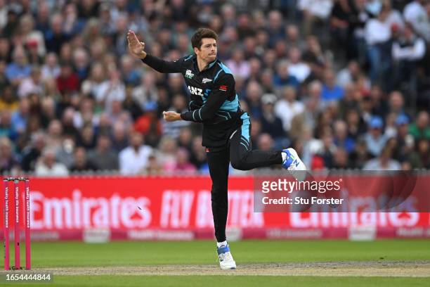 New Zealand bowler Mitchell Santner in bowling action during the 2nd Vitality T20I match between England and New Zealand at Emirates Old Trafford on...
