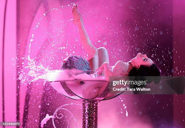 Burlesque star Dita Von Teese performs her campaign glass routine on stage at the 21st annual Fashion Cares AIDS fundraiser held in Toronto's...