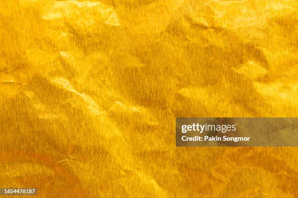 gold paper sheet texture cardboard background. - gold medal stock pictures, royalty-free photos & images