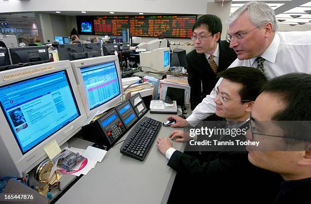 ChinaTradeStyma-April 8, 2005- David Hyma, Vice Chair, BMO Nesbitt Burns and Head of Capital Markets familiarizes CFETS traders visiting from China...