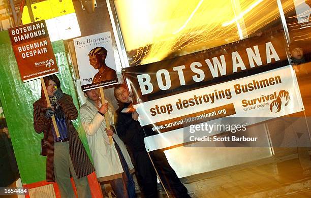 Protesters from Survival For Tribal Peoples stand outside the De Beers LV store launch party November 21, 2002 in London, England. The flagship store...