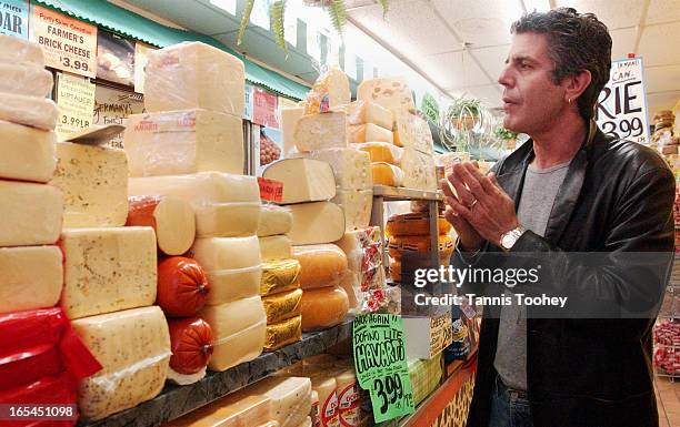 Chef Anthony Bourdain waits for his first sample of Canadian cheese in Mendels Creamery, Kensington Market in Toronto Tuesday April 2, 2002.
