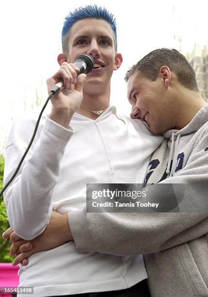 May 11, 2002-Marc Hall thanks supporters as he is hugged by boyfriend Jean-Paul Dumont at a thank you rally held by The Coalition in Support of Marc...