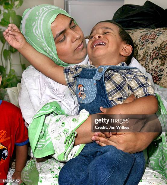 Isa Syed Comforts 15 Year Old Photos and Premium High Res Pictures - Getty Images