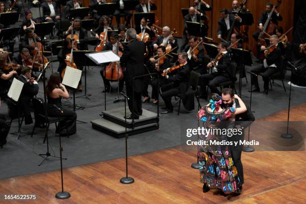 Estudio de la Ópera de Bellas Artes member perform during the symphonic tribute to late singer and composer Jose Alfredo Jimenez at Palacio de Bellas...