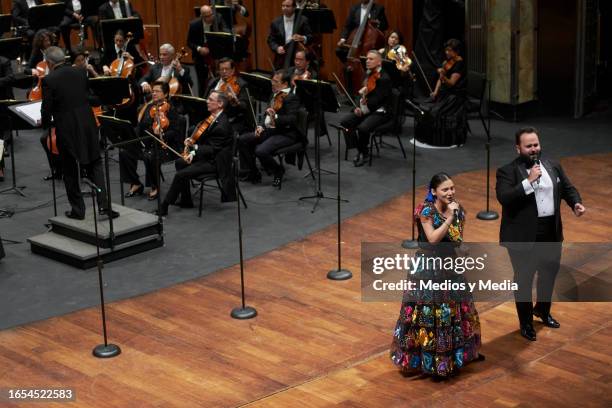 Estudio de la Ópera de Bellas Artes member perform during the symphonic tribute to late singer and composer Jose Alfredo Jimenez at Palacio de Bellas...