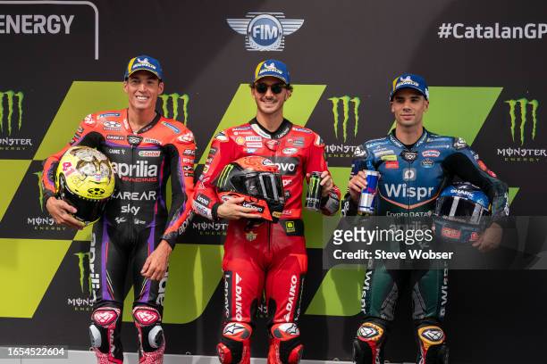 MotoGP Top-3 qualifyers with Aleix Espargaro of Spain and Aprilia Racing , Francesco Bagnaia of Italy and Ducati Lenovo Team and Miguel Oliveira of...