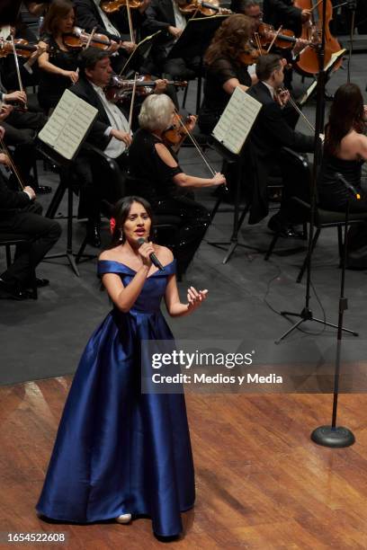 Estudio de la Ópera de Bellas Artes member performs during the symphonic tribute to late singer and composer Jose Alfredo Jimenez at Palacio de...