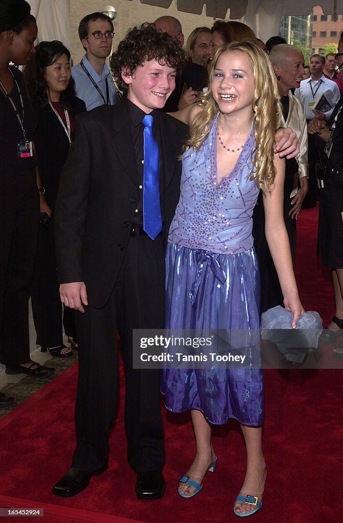 September 7, 2001 Anton Yelchin, 12, and co-star Mika Boorem, 14 pose for photographers at Roy Thomp