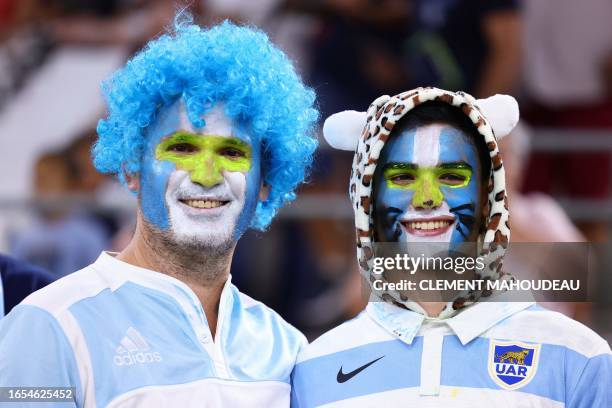 Argentina's supporters wearing face paint in national colours look on from the stands before the France 2023 Rugby World Cup Pool D match between...