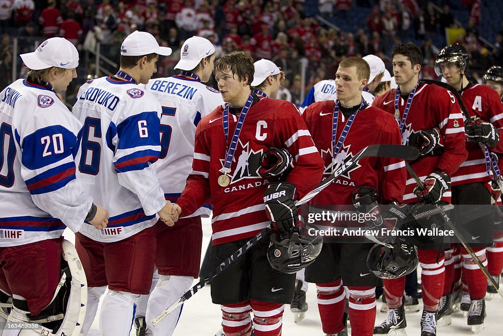 January 5, 2011 Team Canada captain Ryan Ellis leads his team in congratulating Team Russia in their