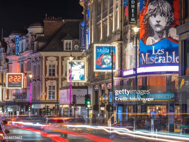 london theatre district shaftesbury avenue west end shows illuminated night - westend stock pictures, royalty-free photos & images