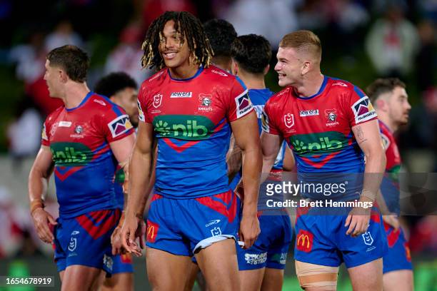 Dominic Young of the Knights celebrates scoring a try with team mates during the round 27 NRL match between St George Illawarra Dragons and Newcastle...