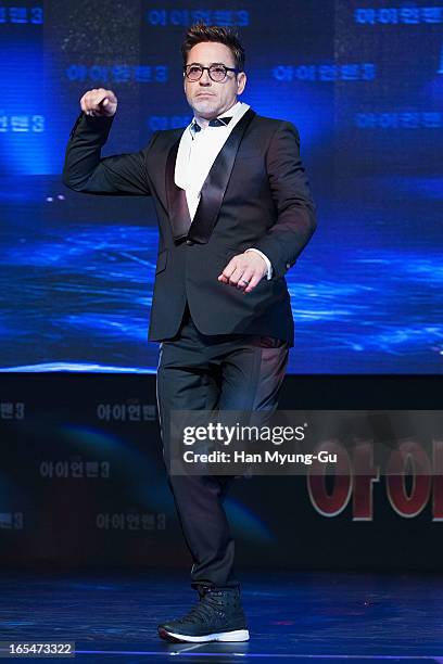 Actor Robert Downey Jr. Dances to a song by South Korean rapper Psy during the 'Iron Man 3' South Korea Premiere at Times Square on April 4, 2013 in...