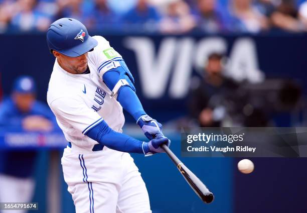 George Springer of the Toronto Blue Jays hits a solo home run in the fourth inning of the game against the Kansas City Royals at Rogers Centre on...