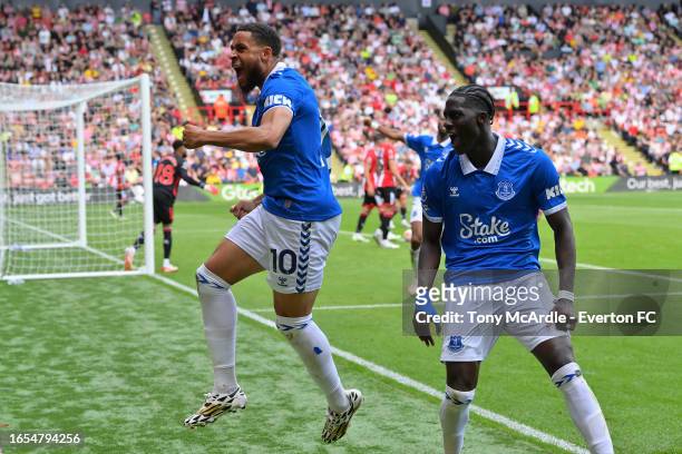 Arnaut Danjuma of Everton celebrates his goal with Amadou Onana during the Premier League match between Sheffield United and Everton FC at Bramall...