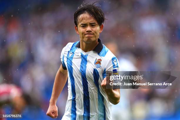 Takefusa Kubo of Real Sociedad celebrates after scoring the team's second goal during the LaLiga EA Sports match between Real Sociedad and Granada CF...